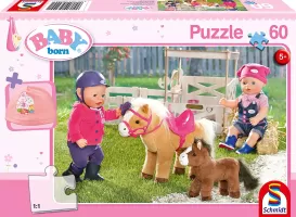 Photo de Puzzle Schmidt - Baby Born fait du poney (60 pièces)